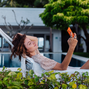 woman-with-phone-resting-lying-hammock-with-mobile-phone_3670_3670.jpg