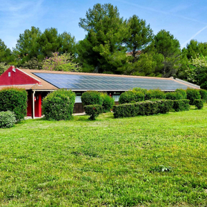 vertical-shot-small-house-with-solar-panels-green-field-canary-islands_1658_1658.jpg