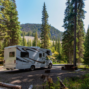 beautiful-campsite-mountains-with-rv-wooden-bench_2740_2740.jpg